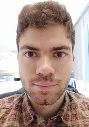 A person taking a selfieDescription automatically generated