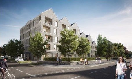 A building with trees and people walking aroundDescription automatically generated