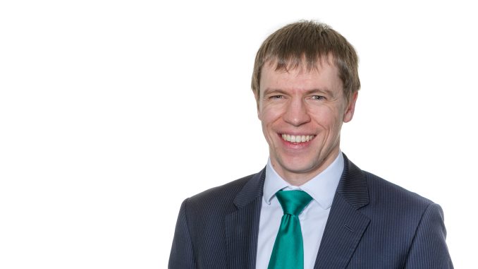 Man standing in front of a white background