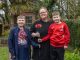 Amy Olsen and her sons Max and Theo with their Remember Me Rose