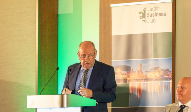Man standing at a podium