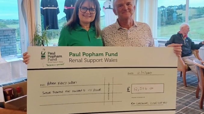 Popham Kidney Support CEO, Joanne Popham with event organiser, Kim Loosmore, holding the cheque of £12,500.