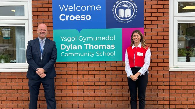 Paul Davies and Rachael Flanagan stood outside Dylan Thomas Community School.