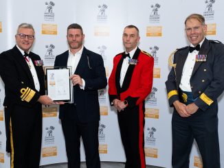 Ian Williams, Regimental Cleaning Services Founder, receiving Regimental Cleaning Services the prestigious Defence Employer Recognition Gold Award.