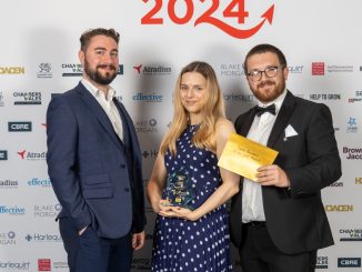 Genesis Biosciences posing with their award at the 2024 Wales Business Awards.