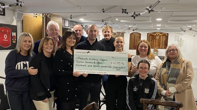 Popham Kidney Support CEO, Joanne Popham (center-left) & Administrator, Ava Houston-Phillips (center-right), with Cwmtwrch Rugby Club committee members.