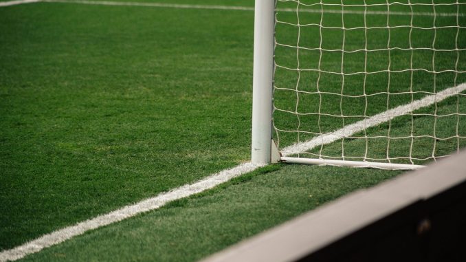white soccer goal on focus photo