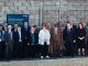 A group of people, including His Excellency Mr Jeremiah Nyamane Mamabolo, High Commissioner of South Africa, at the visit to Aberthaw Power Station.