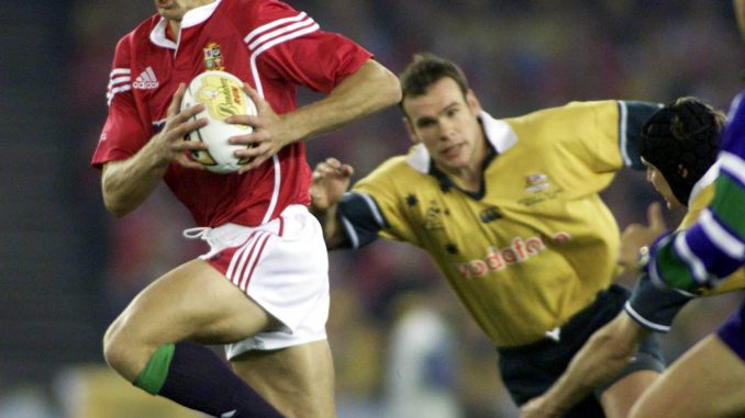 Dafydd James breaks away from the Australian defence during the Second Test match at the Colonial Stadium, Melbourne, Australia.