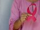 woman in pink and white polka dot shirt