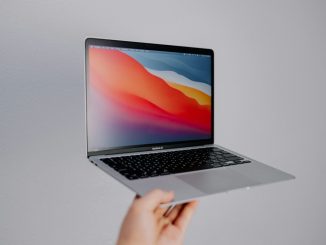 macbook pro on white table
