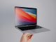 macbook pro on white table