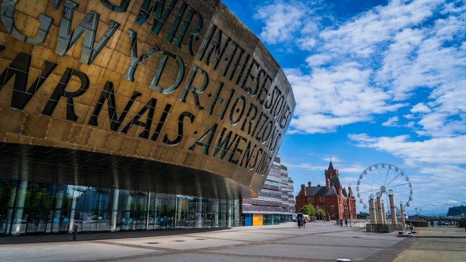 a large building with a giant sign on the side of it