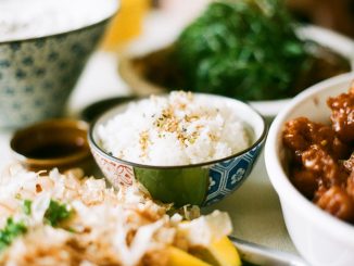 white and blue ceramic bowl with rice